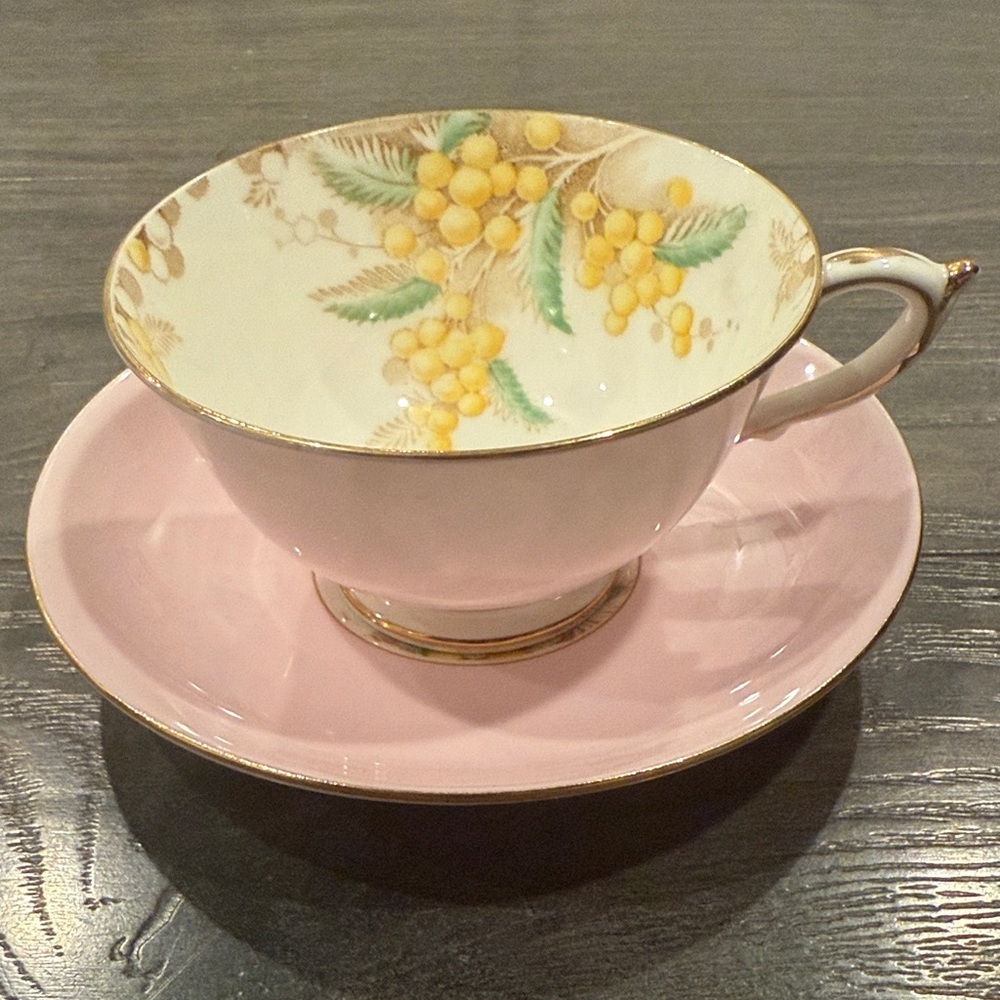 Elegant Pink and Gold Teacup with Saucer